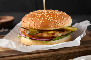 Delicious Chicken Burger with Fresh Ingredients and Artistic Presentation