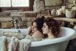 © larrui - Two women enjoying a peaceful, intimate moment together in a cozy rustic bathtub