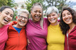 © DisobeyArt - Happy multi generational women having fun together - Multiracial friends laughing on camera after sport workout outdoor - Main focus on african female face