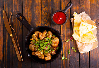 Sticker - fried meat with spices in pan