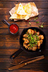 Sticker - fried meat with spices in pan