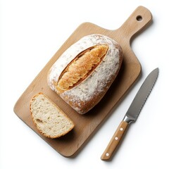 A fresh loaf of bread with a knife beside it on a cutting board