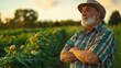 © Daniel - Confident mature farmer in agricultural field.