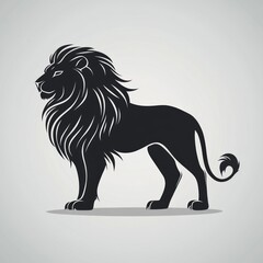 Canvas Print - Silhouette of a lion standing with its mane flowing in the wind.