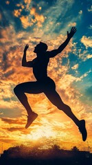 Poster - Silhouette of a man jumping in the air during a beautiful sunset.