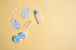 © Iuliia Pilipeichenko - Container for lenses and accessories on a light background. Health and medicine concept