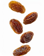 Falling raisin isolated on white background, full depth of field
