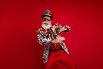 Sticker - Photo of attractive funny santa calus wear jacket having fun celebrating xmas emtpy space isolated red color background