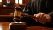 © Seak - Judge in a courtroom, delivering a ruling from the bench with a gavel in hand