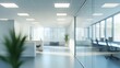 © Yusif - Blurred open space office interior background, ideal for design and layout visualization.