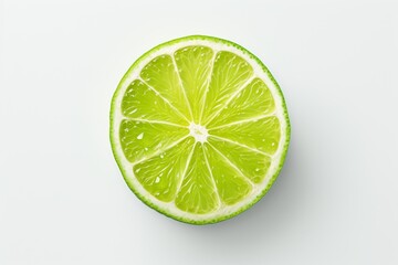 Fresh lime slice on a clean white background showcasing its vibrant color and texture