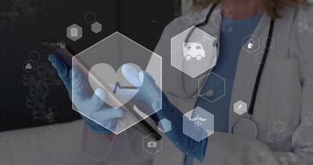 Poster - Animation of medical icons over caucasian female doctor using tablet