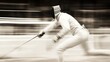 © BerkahStock - A dynamic fencer in motion, showcasing the intensity and speed of the sport.