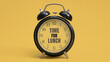 © Lahiru - An alarm clock with 'Time for Lunch' text in middle of it on a yellow background. break for eating, office reminder concept.