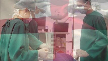 Poster - Animation of flag of england over caucasian surgeons during surgery