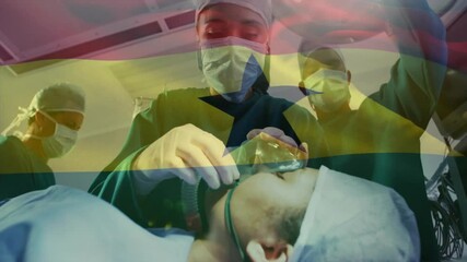 Poster - Animation of flag of ghana over diverse surgeons during surgery