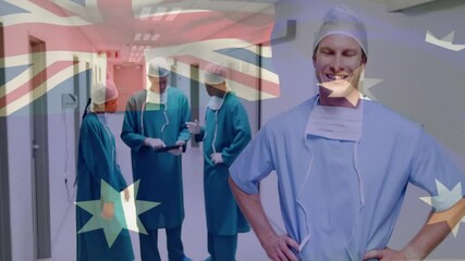Poster - Animation of flag of australia over caucasian surgeons smiling and talking