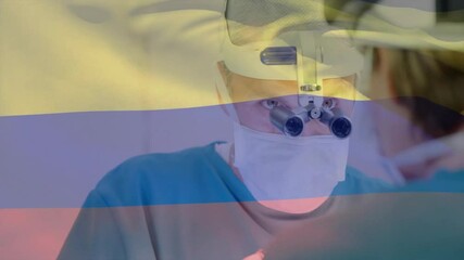 Poster - Animation of flag of colombia over caucasian surgeons during surgery
