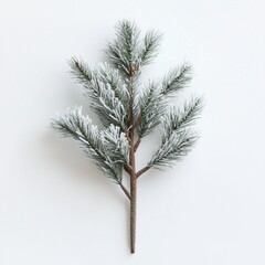 product photo of a single small artificial pine branch with snow, displayed on a white background, i