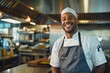 © NikoG - Portrait of a smiling American chef in commercial kitchen