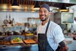 © NikoG - Portrait of a smiling American chef in commercial kitchen
