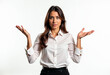 © Graphic Dude - Confused businesswoman shrugging shoulders posing in studio white background portrait corporate business woman confused expression emotion undecided puzzled office worker lady manager female