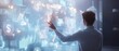 © Hansa & Party - A businessman touches a series of floating financial symbols, triggering holographic economic structures to assemble in midair
