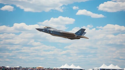 A military jet performing an aerial maneuver against a backdrop of clouds and spectators.