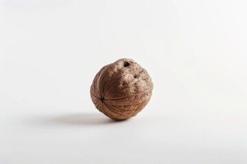 Poster - A close-up of a walnut nut shell on a white background