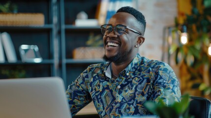 Aufkleber - A person sitting in front of a laptop with a focused expression, possibly working or studying
