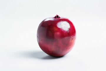 Sticker - A single red apple sits on top of a white surface, with no distractions or background elements