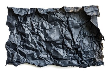 Poster - A piece of crumpled black paper lying on a white surface