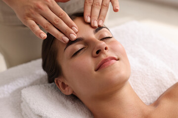 Poster - Attractive woman enjoying face massage, closeup. Beauty procedure