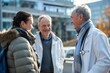 © Joaquin Corbalan - Visitors discuss health updates with a friendly doctor outside the hospital under clear skies and a welcoming atmosphere
