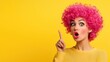 © K-MookPan - Fashionable Woman with Colorful Hair Pointing in Pop Art Style.