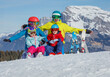 © Sergey Novikov - Family of skier sit smile against a stunning mountain landscape