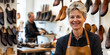 © stockmotion - Maßschuhmacherin in moderner Werkstatt bei der Arbeit an handgefertigten Schuhen
