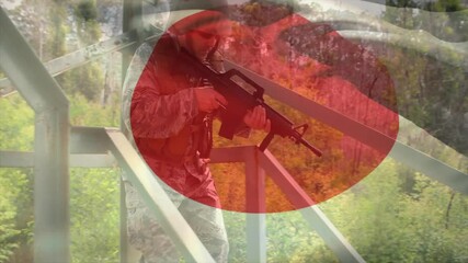Poster - Animation of flag of japan over caucasian male soldier with rifle