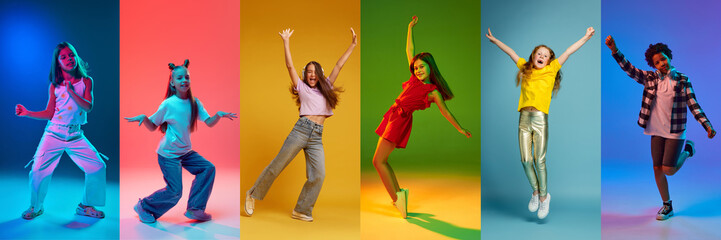 Collage. Full-length image of happy young girls, children in casual stylish clothes cheerfully dancing against multicolored background. Concept of childhood, emotions, hobby. Banner