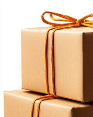 Stylish gift boxes wrapped in brown paper with a bright orange ribbon, ideal for celebrations and special occasions.