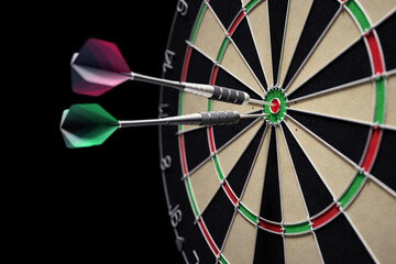Poster - Darts Game. Modern-designed darts, which are sticking out from the classic made dartboard against a black background. 3D rendering graphics on the theme of Sports and Leisure Games.