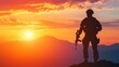 © Khmel - Soldier standing on a mountain peak at sunset, silhouetted against a colorful sky in the evening