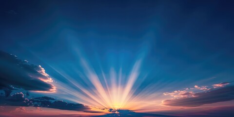 Wall Mural - Light streaking through the deep blue sunset sky