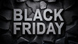 © hardvicore - Stone text 'BLACK FRIDAY' on dark cracked wall background. Shopping and sale concept.