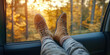 © SnowElf - Woman feet in trendy autumn boots on car door. Feet outside the window at trip. Freedom of car movement in nature.