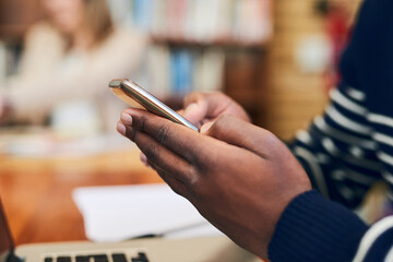 Poster - Phone, library and hands of man with laptop at university for education, communication or online chat. Computer, smartphone and college student on mobile app for study schedule, research or project