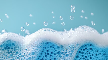 Isolated soap foam, bubbles, and blue sponge