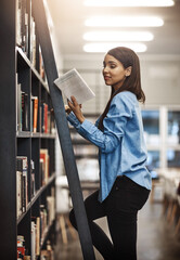 Poster - Woman, college student and read on bookshelf with ladder for text book and research with notebook. Female person, university learner and serious at library for education, literature and knowledge