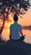 © Stanci - Woman meditating by a tranquil lake at sunset with a peaceful atmosphere