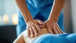 © Outkast - Hands of a Massage Therapist Pressing on a Person's Back